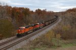 A pair of pumpkins lead coal loads for Detroit Edison past some of the last fall foliage